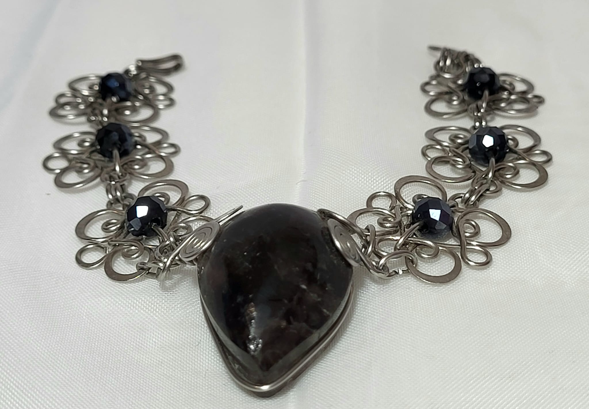 Manchette obsidienne noire volcanique acier protection mexique